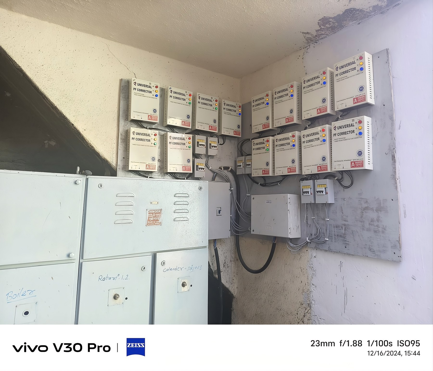 Wall-mounted Universal PF Corrector units at a factory
