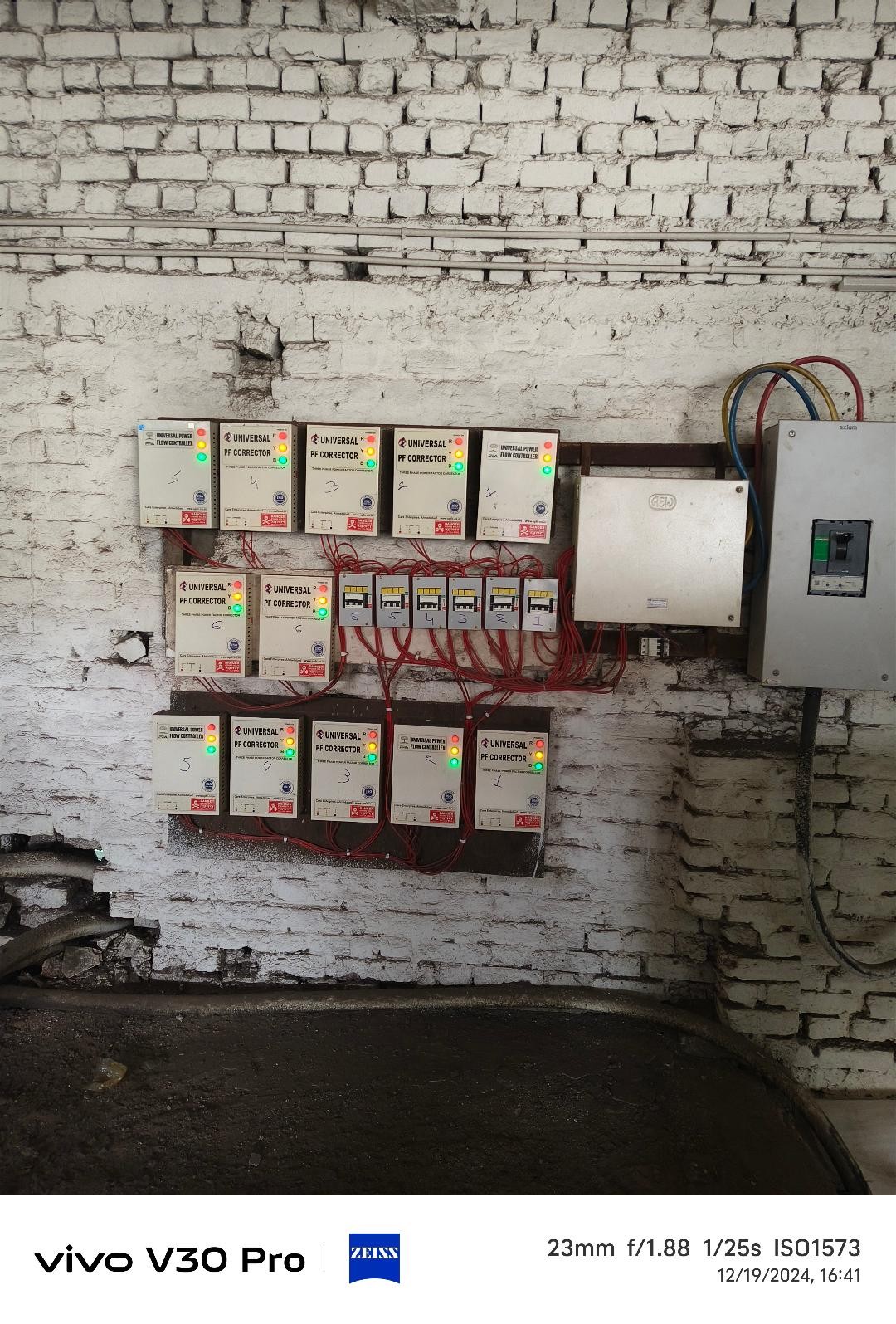 Universal PF Corrector units mounted near a sink area